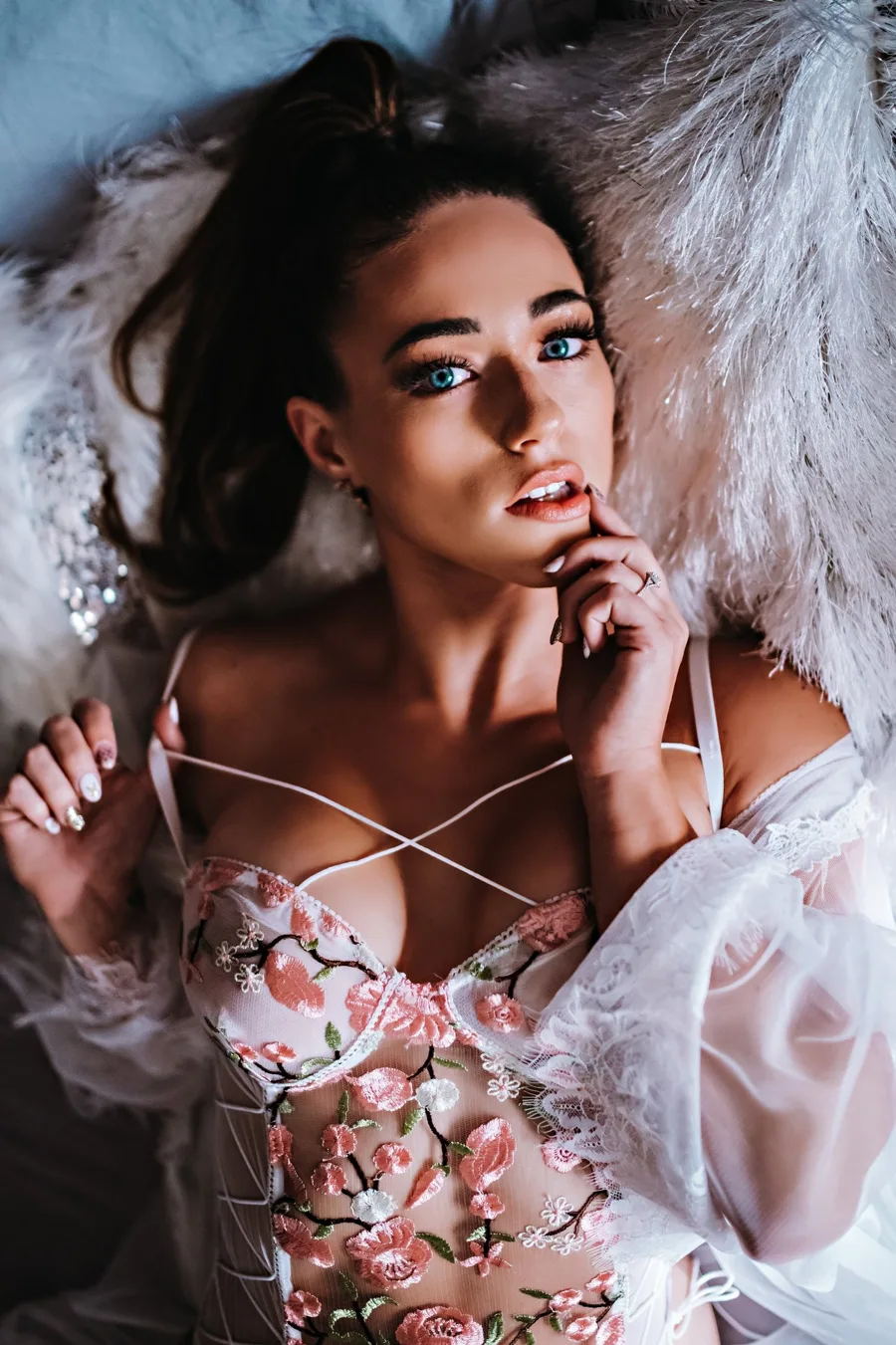 A client relaxing into a soft-light beauty portrait